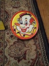 Vintage Tin Clown Noise Maker,