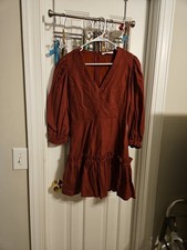 Karlie Solid Wrap Ruffle Dress in Rust