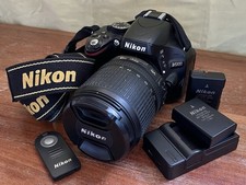 Nikon D5100 DSLR Camera + 18-105mm VR Lens + 2 Batteries + Charger
