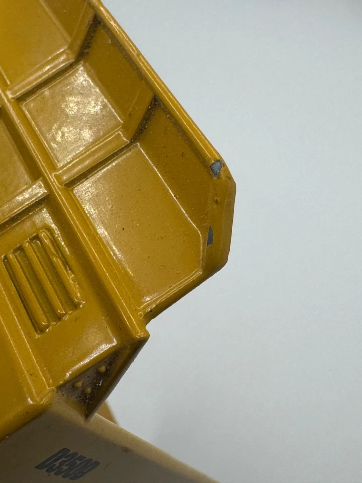 Camión de volteo articulado Cat Caterpillar D350D fundido a presión ERTL 2431 1992 amarillo Foto 2 de 4