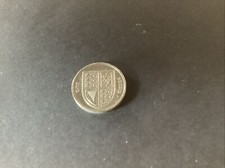 2012. = one pound coin-  Royal shield = Good Condition = From Circulation