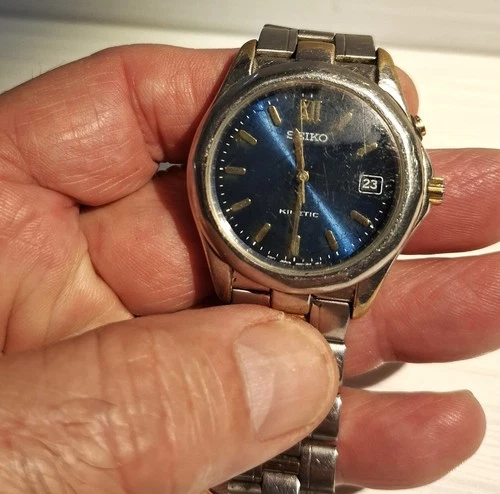 Vintage 80's Seiko Kinetic men wristwatch works when shaken then stops