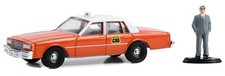 GREENLIGHT,CHEVROLET Impala Capitol cab taxi 1981 orange with man in suit fro...