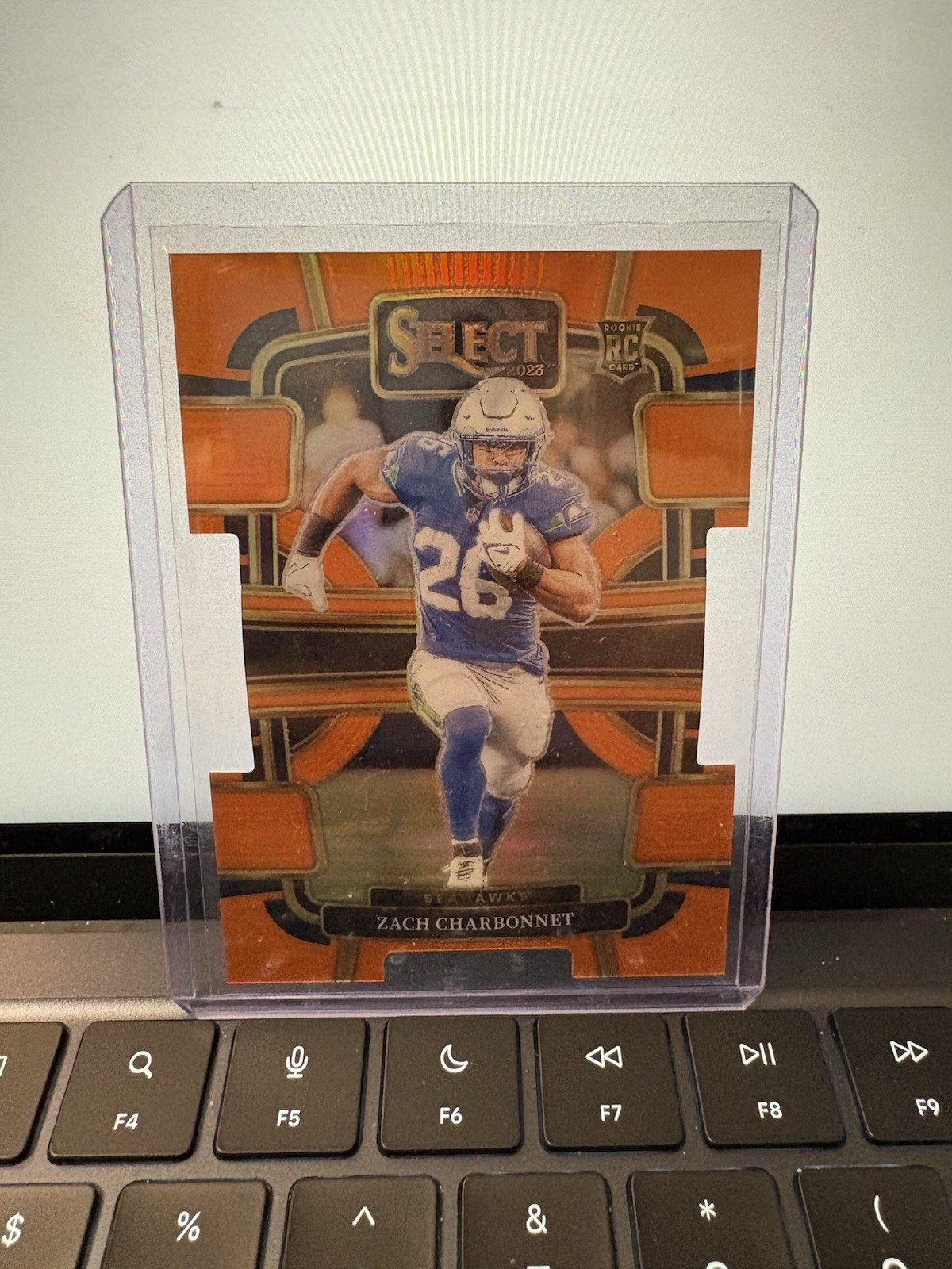 2023  Select - Concourse Zach Charbonnet #86 Orange Prizm Die-Cut /499 (RC)