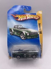 2009 Hot Wheels New Models Triumph TR6 33 Green Bent Card