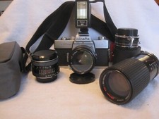    MINOLTA SRT202 SLR FILM CAMERA BUNDLE 2-55MM, 80-200MM LENS, FLASH CNVRT 3PT8