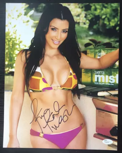 Kim Kardashian Signed Autograph 11x14 Photo JSA COA Sexy SI Swimsuit Model Rare