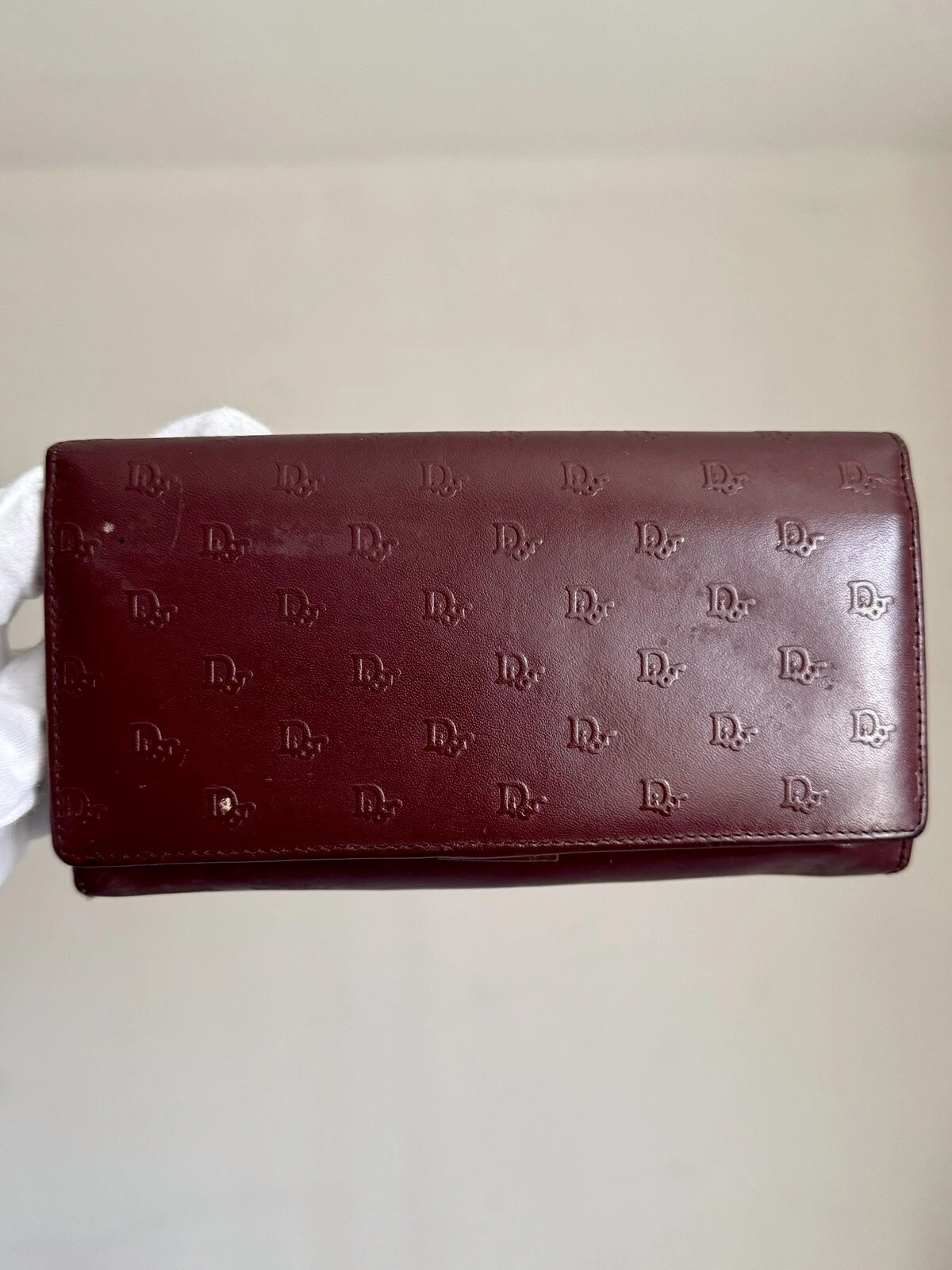 Portefeuille vintage Christian Dior rouge foncé oblique trotteur logo en cuir gaufré