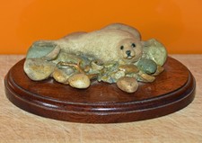 Sherratt & Simpson Resin Seal Pup on wooden plinthl 19 cms across approx