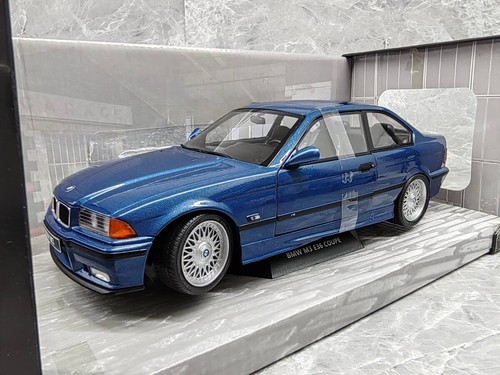 Miniature UT Models 1/18 – BMW 328i Coupé E36 Jaune, Occasion (pièces Manquantes)