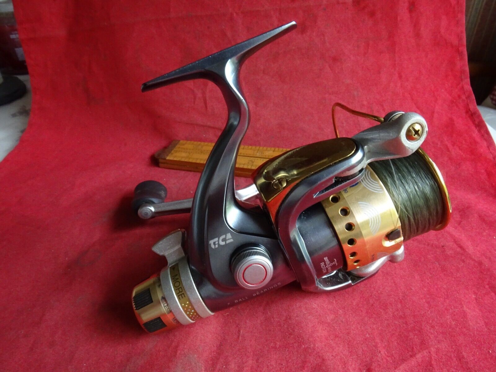A VERY GOOD LIGHTLY USED TICA SD3559 SPINNING/MATCH REEL REEL WITH FIGHTING DRAG