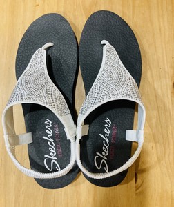 skechers yoga foam sandals white