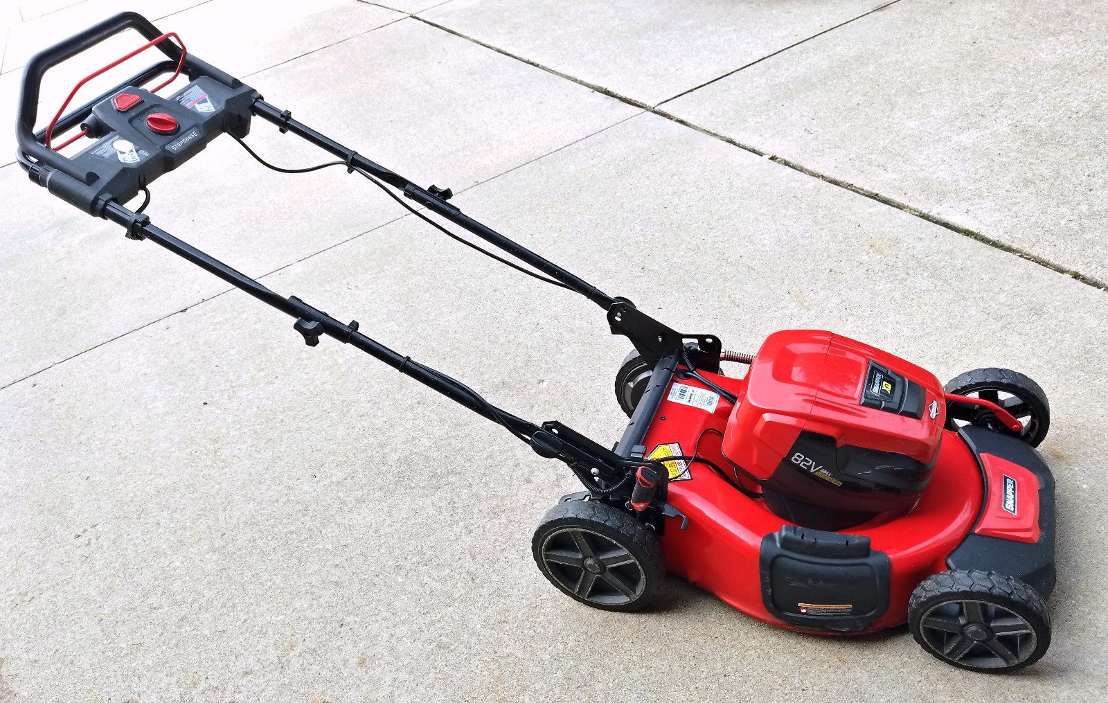 Snapper XD 82V Max Cordless Push Lawn Mower with three batte