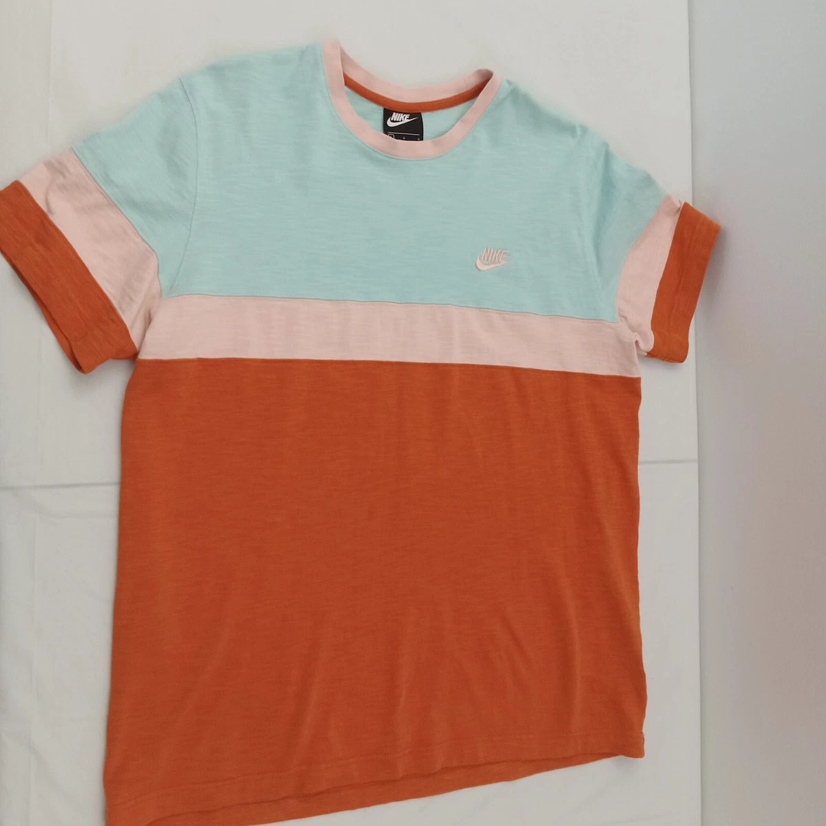 Teal and orange nike shirt hotsell