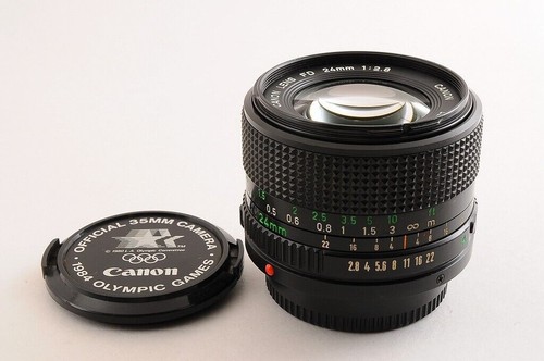 【CASI COMO NUEVO+】CANON NEW FD NFD 24mm F/2.8 MF Lens Cap + 1984 OLYMPIC... - Imagen 2 de 12