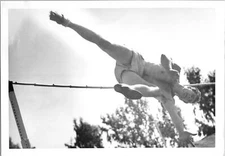 Man jumping over high jump bar U of P Stockton CA? Found Photo V0722
