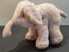 STEIFF Elefant COSY TRAMPY, ca. 20cm hoch, mit Knopf und Fahne