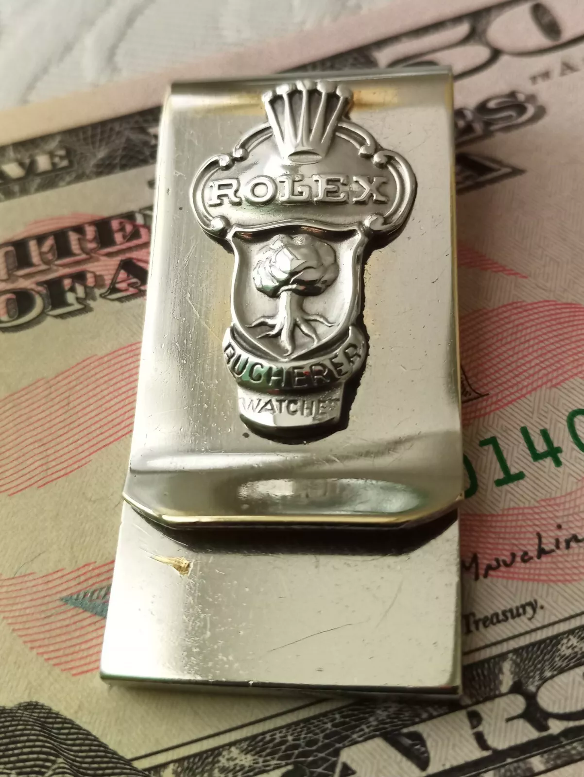 Clip argent vintage Christian Dior avec pendentif Rolex 