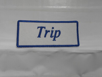 TRIP  NEW EMBROIDERED  SEW / IRON ON NAME PATCH BLUE ON WHITE 1-1/2t X 3-1/2w