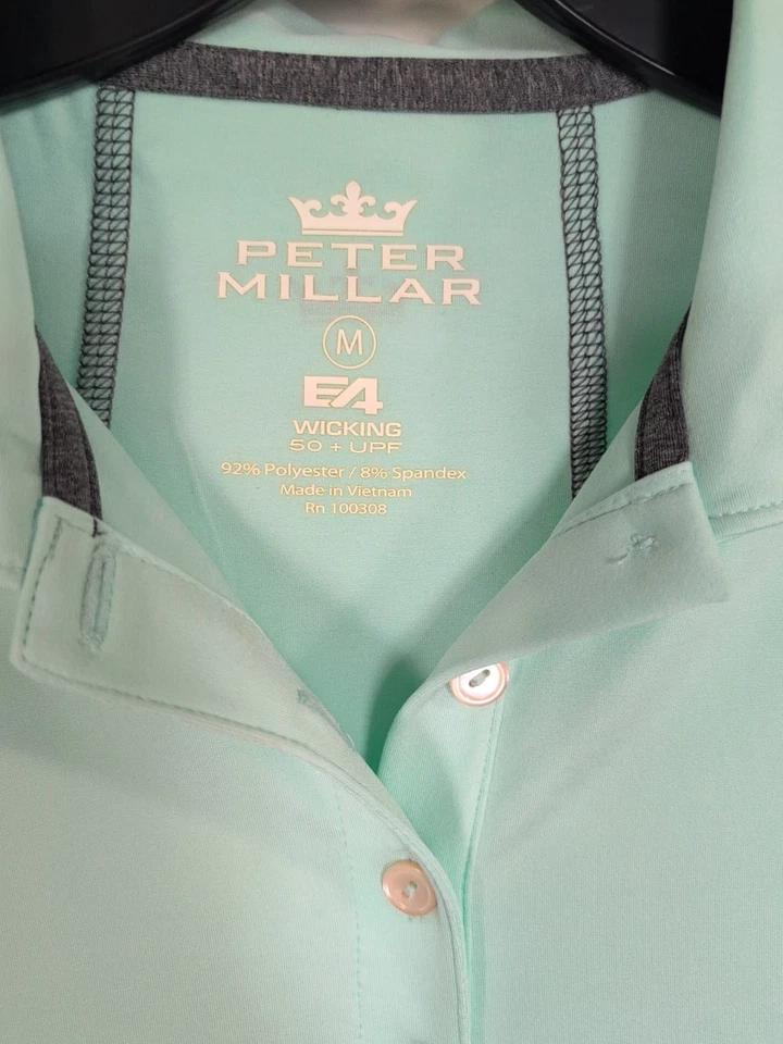 Polo de golf Peter Millar Aqua con costuras grises manga corta talla M 50+ UPF para mujer Foto 2 de 3