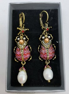 alexander mcqueen beetle earrings