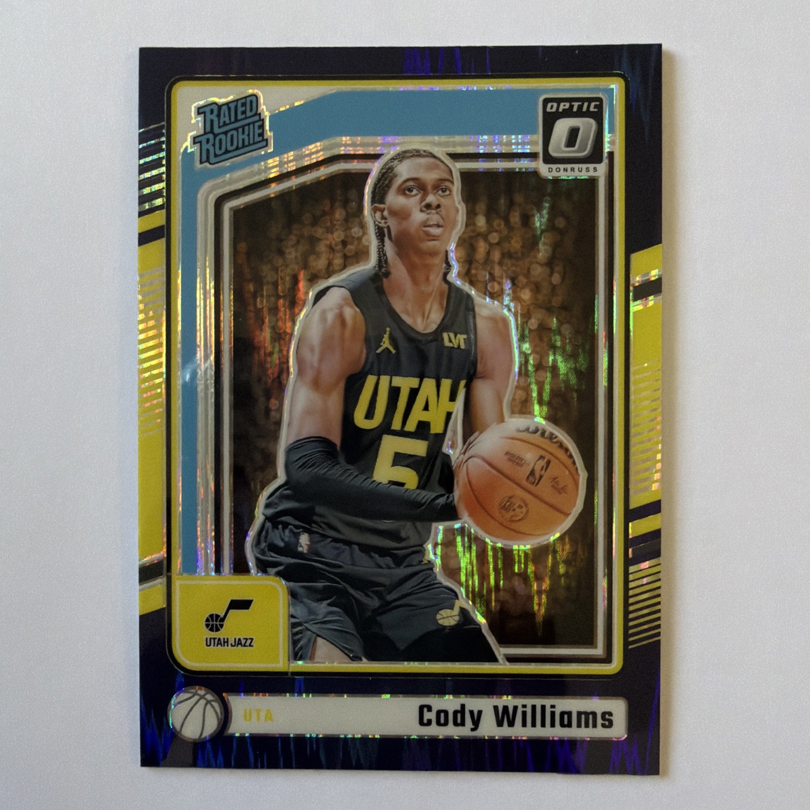 2024-25 Panini Donruss Optic Cody Williams Rated Rookie Purple Shock Prizm #298