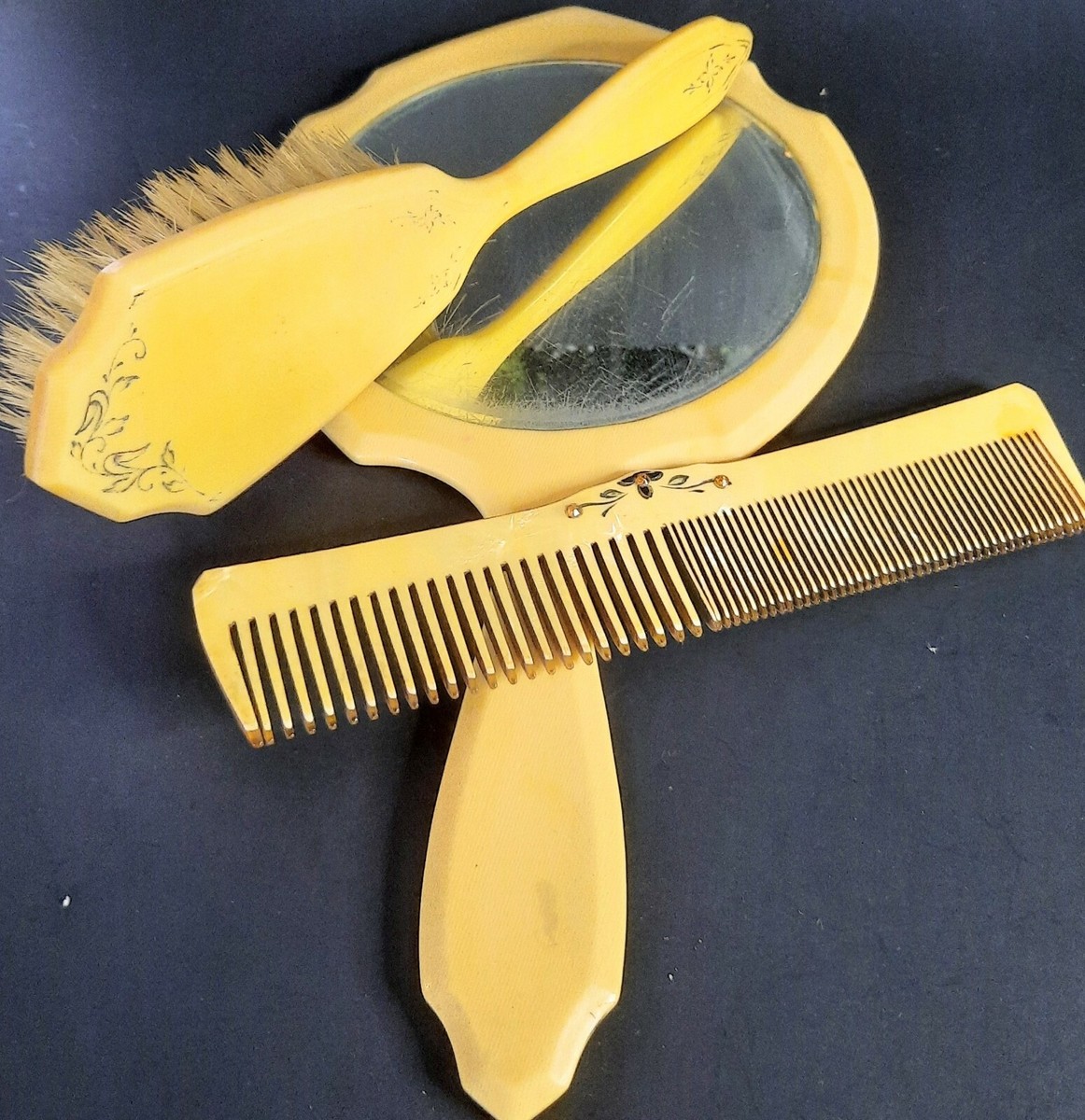 Celluloid Vintage Gold Comb, Brush, and Mirror Set Vintage Bakelite Celluloid mirror, Gold in color brush and  main image 3