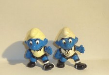 SMERF ODSTRASZAJĄCY wariant odlewu/kształtu z zagiętym ramieniem PIŁKA NA NOGI SMERFY '88 ORI