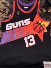 Steve Nash 1996-97 Suns jersey. Primary color black with the orange n purple