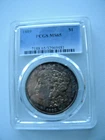 1889 Morgan Silver Dollar, PCGS MS65,  Dramatic gold and violet toning.