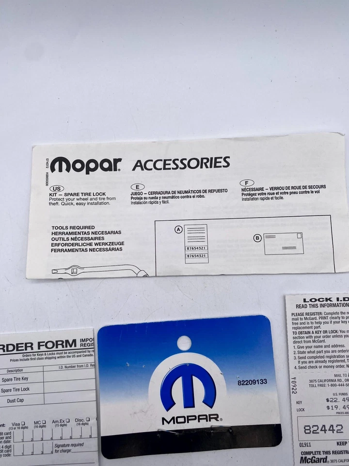 Bloqueo de cabrestante de neumático de repuesto Mopar 82209133 para Dodge Dakota 05-11 y Dodge Ram 09-18 Foto 2 de 4