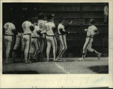 1985 Press Photo Union Baseball player is congratulated by teammates after HR