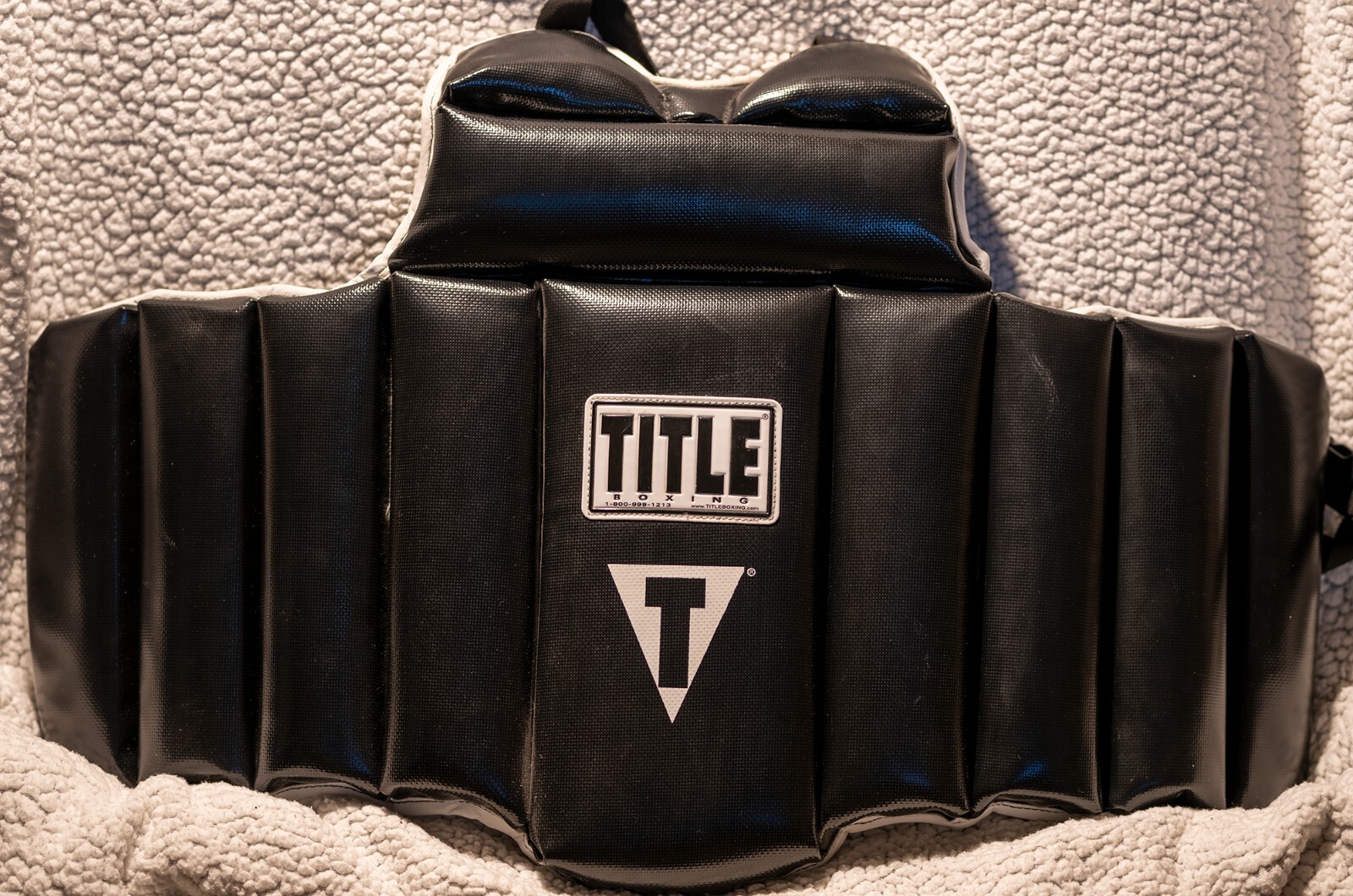 TITLE Boxing Body Protector. Black, Adult size. Good condition. Free