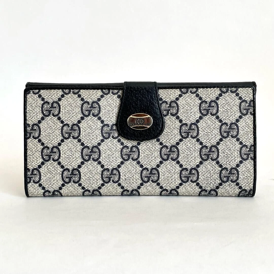 Portefeuille long Gucci GG Supreme avec crochet bleu marine rabat