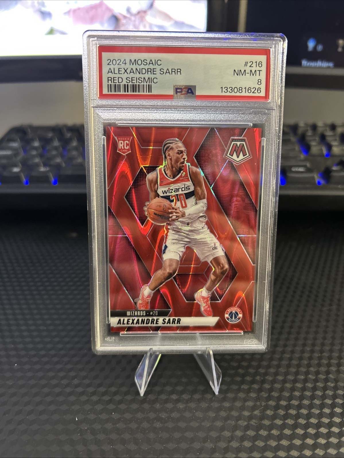 2024-25 Panini Mosaic - Rookies Alex Sarr #216 Red Seismic Mosaic /299 (RC)