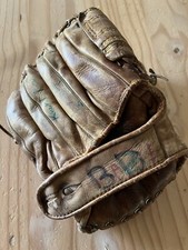 vintage leather baseball glove cowhide leather with engraved player figure