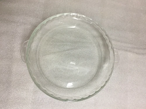 Vintage Pyrex #229 Pie Plate Fluted 9.5 in. clear, minor scratches, w/handles