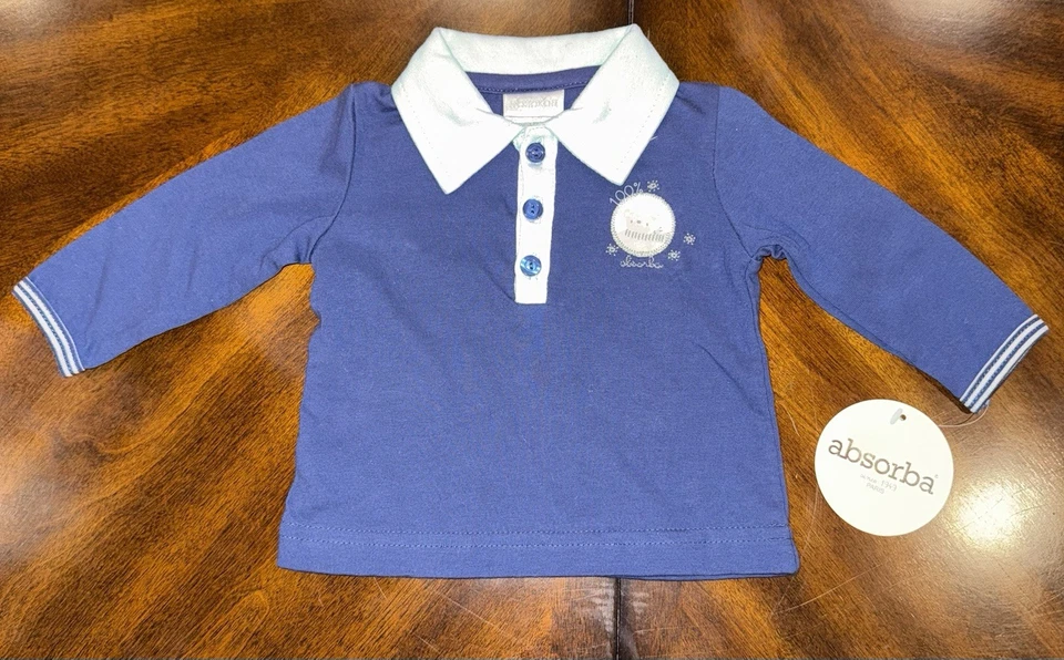 Polo azul manga larga bebé niño nuevo con etiquetas, talla 0-3M. Absorba 100% algodón. Foto 3 de 4