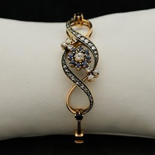 BRACCIALE RIGIDO VINTAGE IN ORO ROSA 12 KT CON DIAMANTI 0.82CT E ZAFFIRI 0.44 CT