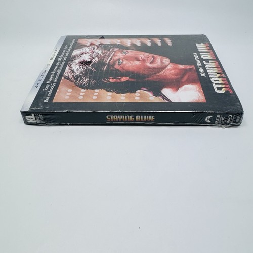Blu-ray 4K UHD - Staying Alive (+ Blu-ray, with Slip Cover, John Tavolta) New - Foto 6 di 6