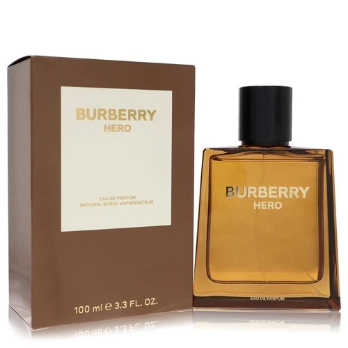 Brown box with white Burberry Hero Eau De Parfum Spray 3.4 oz / e 100 ml bottle with black cap on reflective surface.