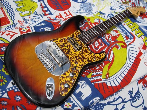 gold caster guitar
