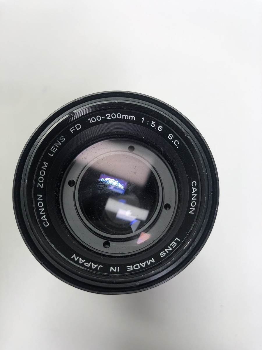 Canon FD Zoom 100-200mm 1:5.6 S.C. Lens W/ Caps & Filter