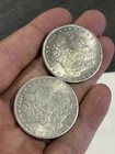 TWO FAUX OR NOT GENUINE MORGAN DOLLARS  1879 CC & 1881 S Jewelry COINS