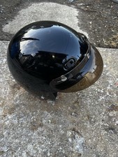This product is a Fuel DOT-certified gloss black motorcycle helmet