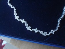 Halskette, Swarovski, unregelmäßig angeordnete Steinchen, Original Karton!