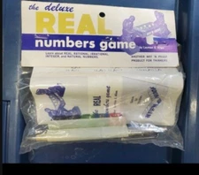 The deluxe real numbers game