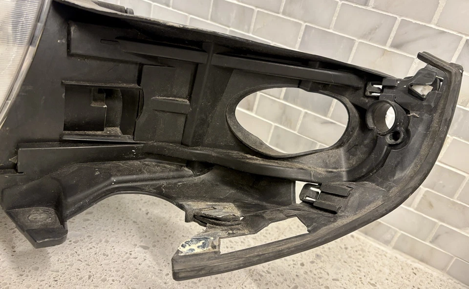 Faro izquierdo (halógeno) Saab 9-5 2002-2005 OEM 5142096 Foto 2 de 4