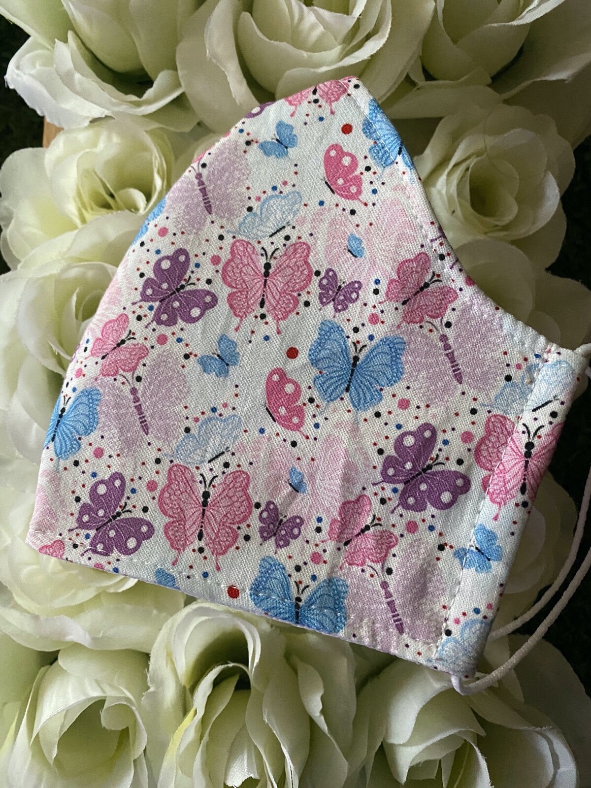 Mascarilla de tela + TNT + ranuras para filtro + Mariposas
