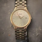 Vintage Seiko V722-7058 Quartz 33mm Gold Tone Champagne Dial Date Watch Working